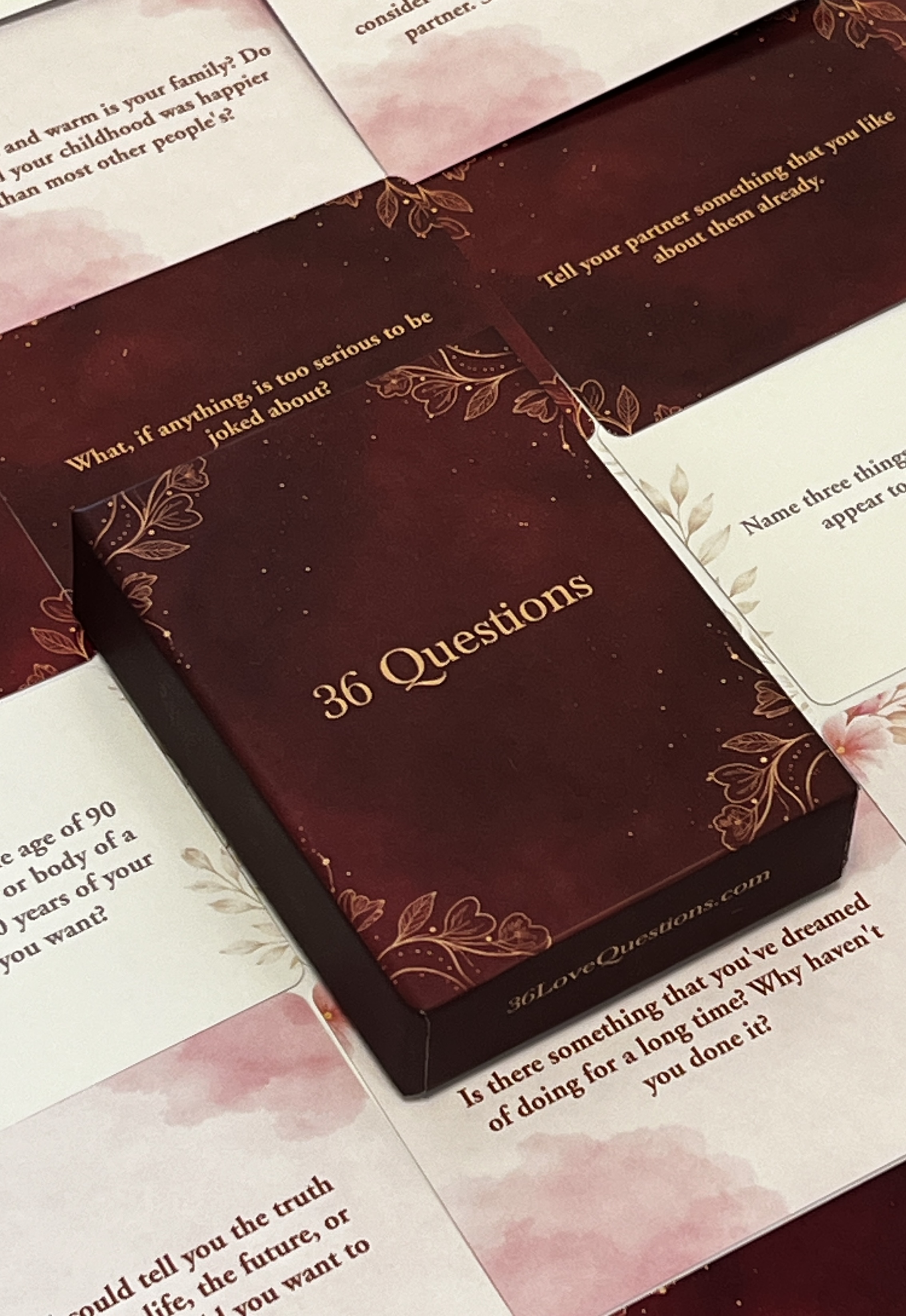 36 Love Questions box surrounded by question cards showing real prompts